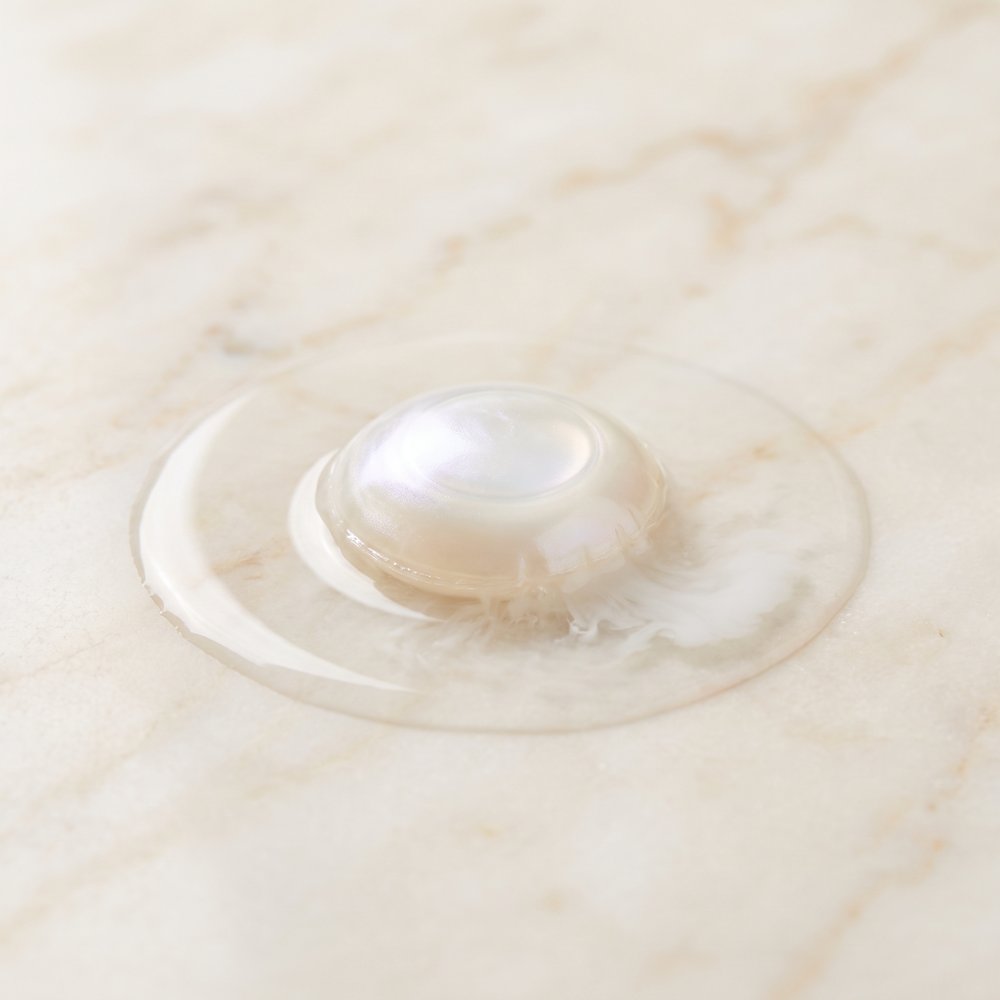 A laundry pearl dissolving in water